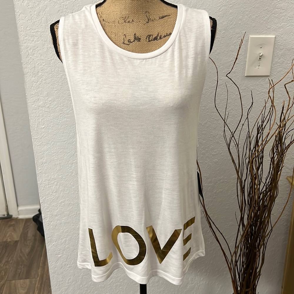 LOVE BRAVERY top from Lady Gaga and Elton John collection